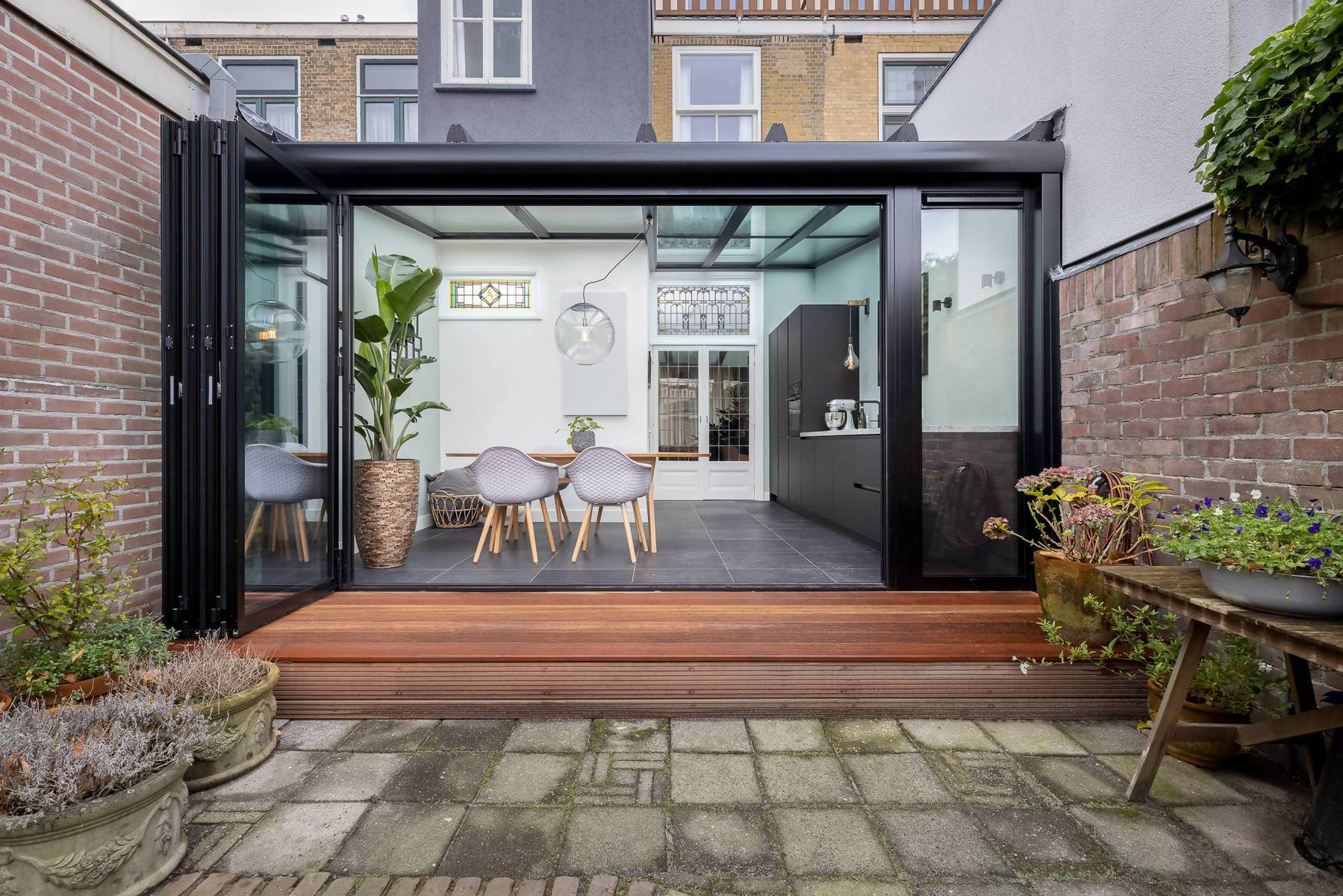 Moderne serre aanbouw jaren 30 woning