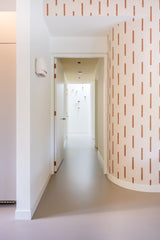 Warm familiehuis met natuurlijk interieur en doordacht lichtplan