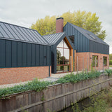 Bijzondere woonbeleving met industriële uitstraling-Brandvries-exterieur vrijstaand-Bijzondere Woonbeleving met Industriële Uitstraling -OBLY