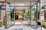 Bronzen stalen kozijnen & houten gevelbekleding-JAREN 30 ARCHITECT-interieur ontwerp,leefkeuken,moderne aanbouw,renovatie,stalen kozijnen,woning uitbreiding-Renovatie jaren 30 woning met moderne aanbouw-OBLY