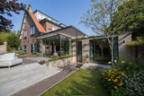 Bronzen stalen kozijnen & houten gevelbekleding-JAREN 30 ARCHITECT-interieur ontwerp,leefkeuken,moderne aanbouw,renovatie,stalen kozijnen,woning uitbreiding-Renovatie jaren 30 woning met moderne aanbouw-OBLY