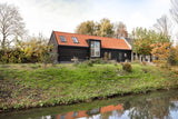 De transformatie van een historisch dijkhuis-BRANDVRIES – architectuur collectief-Aanbouw,Architectuur,glazen pui,houten gevelbekleding,Huis verbouwen,moderne woning,renovatie,schuurwoning,uitbouw,veranda,Verbouwing,Verbouwing inspiratie,Woning uitbreiden,Woningontwerp,Woningrenovatie,Wooninspiratie-Schuurwoning uitbreiden | Moderne uitbreiding met glas-OBLY
