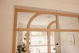 Eiken taatsdeur met boogverdeling in jaren 30 woning-archidoors-Binnendeur met glas,Boogdeur,Deur met roedeverdeling,eiken,Eiken taatsdeur,eikendesign,Glasdeur op maat,Glaswand,Houten binnendeur,Houten taatsdeur,Interieurdesign,Klassieke binnendeur,Maatwerk deur,Maatwerk interieur,roomdivider,Stalen deur look,Taatsdeur met glas,Woonkamer-Eiken taatsdeur met glas en boog | Jaren 30 interieur-OBLY