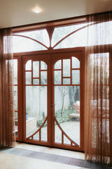 Houten boogdeur en voordeur op maat