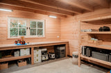 Houten bijgebouw met overkapping-Bosmaat-buitenverblijf,houtentuinhuis,landelijketuin,maatwerkhoutbouw,robuustehoutconstructie,tuinberging,veranda-OBLY
