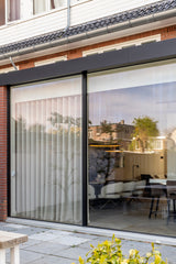 Jaren 30 woning met moderne aanbouw en luxe interieur