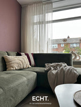 Sfeervolle woonkamer met karaktervolle eethoek