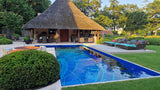 Landelijke Tuin met Verouderde Travertin Apulia Ivory-Van den Heuvel & Van Duuren-landelijke tuin,luxe tuin ontwerp,Tuin,tuin met zwembad,tuin met zwembad en terras,zwembad met natuursteen-OBLY