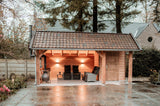 Landelijke overkapping met buitenhaard-Bosmaat-buitenhaard,buitenlounge,houtenoverkapping,landelijketuin,maatwerkhoutbouw,sfeervolletuin,tuinverblijf-Houten Overkapping met Buitenhaard en Loungegedeelte-OBLY