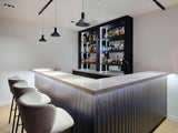 Luxe Cinewall en Bar met Eiken Fineer in Taj Mahal Stijl-Anselm Oome Interieurbouw-bar,cinewall,design verlichting,eiken,eiken fineer,ingebouwde speakers,modern interieur,tv wand,wandmeubel.-OBLY