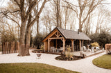 Luxe eiken buitenverblijf met ambachtelijke houtconstructie-Bosmaat-authentiekvakmanschap,eikenconstructie,houtenbuitenverblijf,landelijke tuin,luxeoverkapping,maatwerkhoutbouw,tuinpaviljoen-Luxe Houten Buitenverblijf met Authentieke Eiken Constructie-OBLY