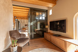 Maatwerk TV-wand met verborgen deur en stalen schuifpui-MH Interieurdesign-maatwerk tv-wand,stalen schuifpui,tv meubel op maat,verborgen deur,woonkamer inspiratie-OBLY