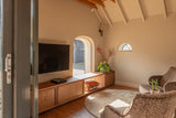 Maatwerk TV-wand met verborgen deur en stalen schuifpui-MH Interieurdesign-maatwerk tv-wand,stalen schuifpui,tv meubel op maat,verborgen deur,woonkamer inspiratie-OBLY