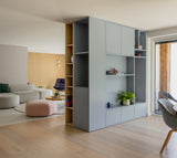 Maatwerk Wandkast met Ensuite Schuifdeur | Witteveen Interieurbouw-WITTEVEEN MEUBEL & INTERIEURBOUW-ensuite schuifdeur,maatwerk wandkast,moderne woonkamer,opbergkast op maat,tv wand op maat-OBLY