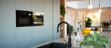 Milano keuken met fjordgroene kastenwand-Vloerenhuis Amsterdam-Keuken-Milano eiken fineer keuken met fjordgroene kastenwand-OBLY