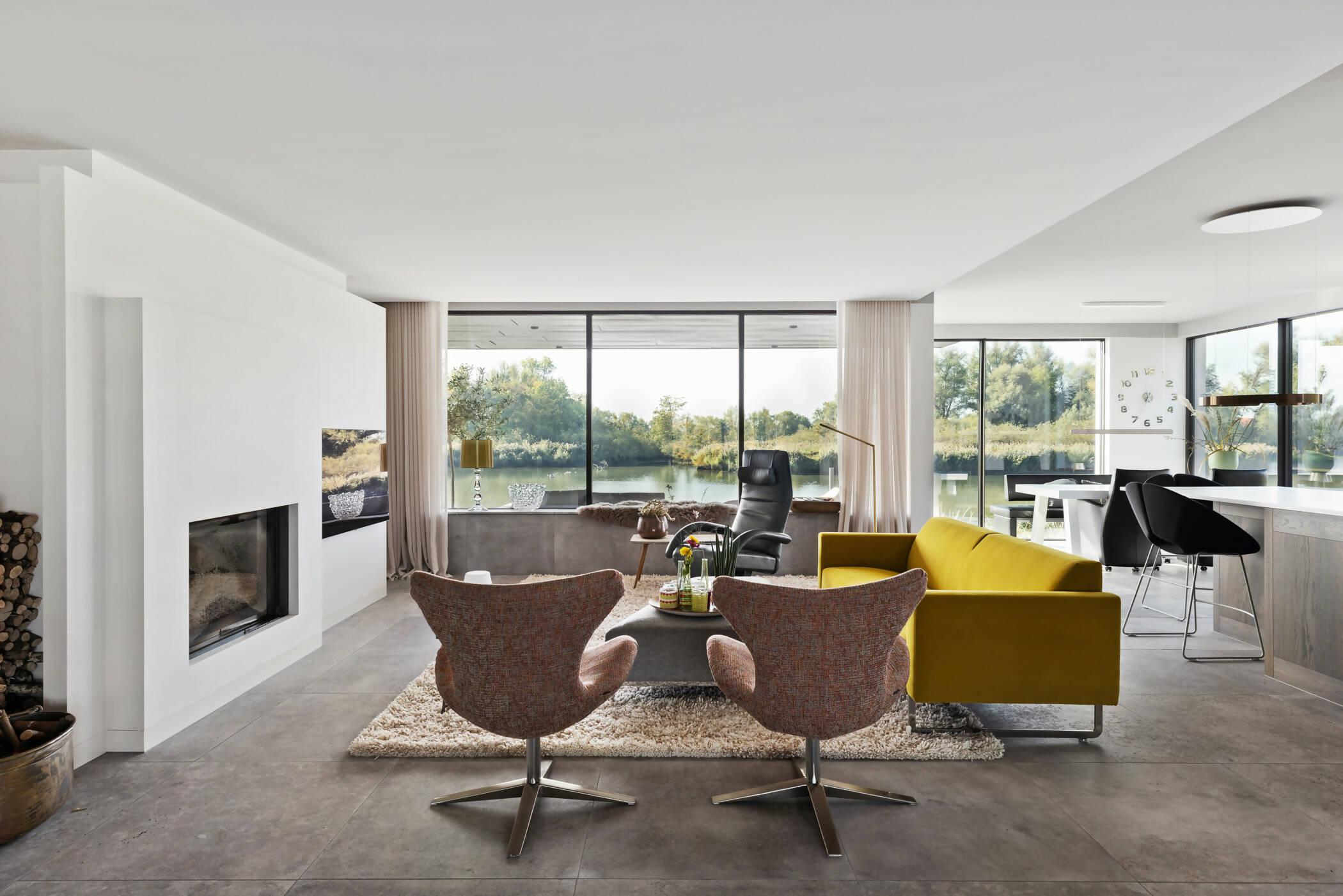 Moderne Droom Villa aan het water-Van den Heuvel & Van Duuren-woonkamer-moderne-droom-villa-aan-het-water-OBLY