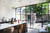 Moderne aanbouw jaren 30 woning met stalen pui-JAREN 30 ARCHITECT-bamboe gevelbekleding,duurzame uitbreiding,leefkeuken,renovatie woning,stalen pui-Jaren 30 woning met bamboe aanbouw-OBLY
