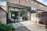 Moderne aanbouw jaren 30 woning met stalen pui-JAREN 30 ARCHITECT-bamboe gevelbekleding,duurzame uitbreiding,leefkeuken,renovatie woning,stalen pui-Jaren 30 woning met bamboe aanbouw-OBLY