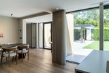 Moderne gezinswoning met open indeling-Bureau Kemps Architecten-woonkamer-Radicale openheid en verbonden leefruimtes in een familiewoning-OBLY