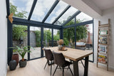 Moderne serre met glazen dak-Solarlux Nederland BV-aluminium serre,glazen serre,moderne serre,serre aanbouw,serre met glazen dak-Moderne serre met glazen dak en aluminium kozijnen-OBLY