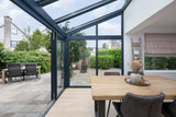 Moderne serre met glazen dak-Solarlux Nederland BV-aluminium serre,glazen serre,moderne serre,serre aanbouw,serre met glazen dak-Moderne serre met glazen dak en aluminium kozijnen-OBLY
