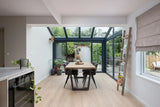 Moderne serre met glazen dak-Solarlux Nederland BV-aluminium serre,glazen serre,moderne serre,serre aanbouw,serre met glazen dak-Moderne serre met glazen dak en aluminium kozijnen-OBLY