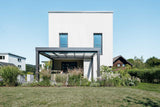 Moderne terrasoverkapping met glazen dak-Solarlux Nederland BV-aluminium terrasoverkapping,glazen dak terras,moderne overkapping,terrasoverkapping,terrasoverkapping glas-Terrasoverkapping met glazen dak en aluminium frame-OBLY
