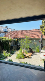 Natuurlijke stadstuin met organische beplanting-The Green Fix-biodiverse tuin,duurzame tuin,grindpad tuin,groene tuin,natuurlijke beplanting,natuurlijke stadstuin,onderhoudsvriendelijke tuin,organische tuin,siergrassen,stadstuin,staptegels tuin,The Green Fix,vaste planten-Natuurlijke stadstuin met organische beplanting | The Green Fix-OBLY