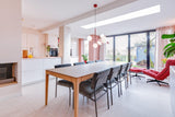 Slimme maatwerkoplossingen in een moderne gezinswoning-oker&goud-boekenkast op maat,kleur- en materiaaladvies,modern interieur,moderne woning,open leefruimte,terrazzo,trapmeubel,woonkeuken-Moderne gezinswoning met maatwerk interieur | OKER&GOUD-OBLY