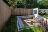 Strakke tuin met maatwerk zitkuil en Millboard-vlonder-Wooddeck-architectonische tuin,design tuin,Golden Oak,houten vlonder,luxe tuin,maatwerk zitbanken,Millboard vlonder,onderhoudsarme vlonder,verdiept loungegedeelte,vlonder,zitkuil-Moderne tuin met verdiept loungegedeelte | Millboard vlonder-OBLY