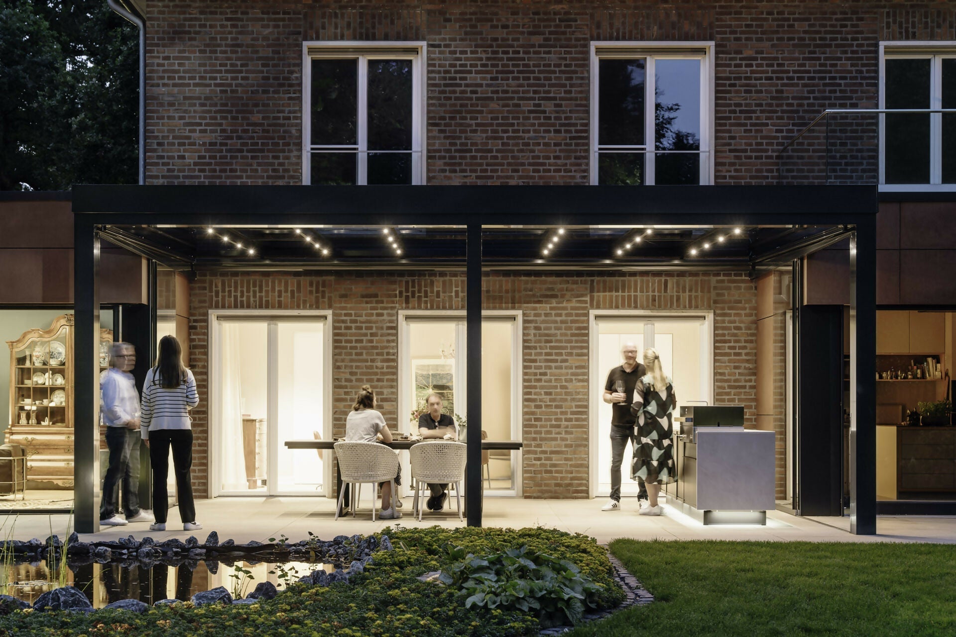 Tuinkamer voor Elk Seizoen-Solarlux Nederland BV-aluminium tuinkamer,binnen buiten wonen,glazen tuinkamer,moderne tuinkamer,Tuinkamer,tuinkamer aan huis,tuinkamer aanbouw,tuinkamer design,tuinkamer inspiratie,tuinkamer met glas-OBLY