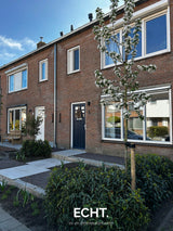 Sfeervolle voortuin voor een rijtjeswoning