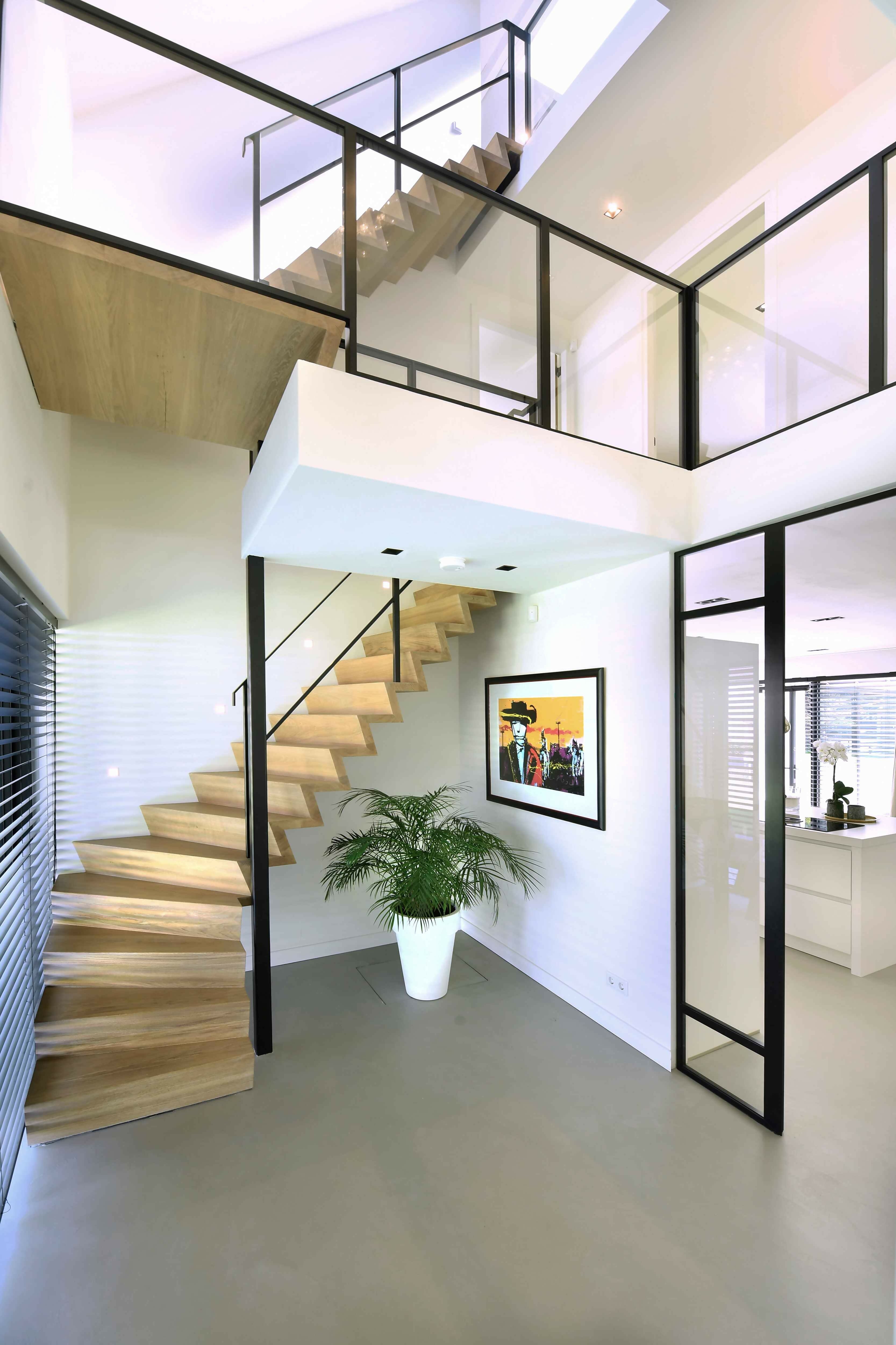 Woonbeton in moderne villa-Berkers Vloeren-woonkamer-Moderne villa met stijlvolle woonbetonvloer | Duurzaam & eigentijds-OBLY