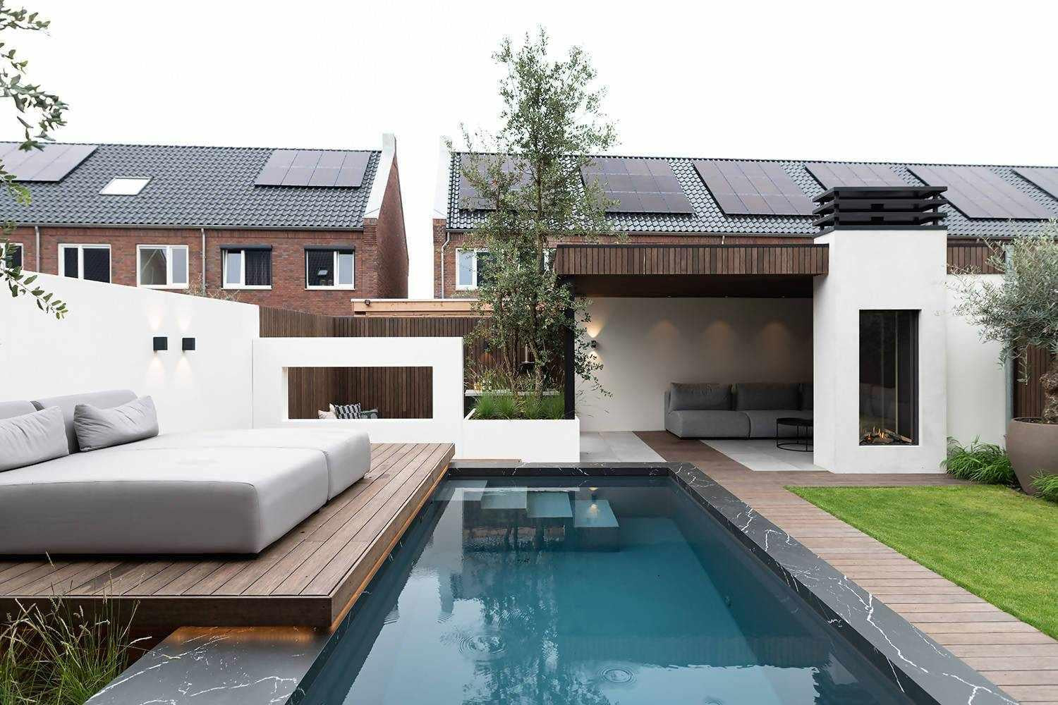 2 luxueuze buitenkeuken-elementen-COOXS-buitenkeuken met pizzaoven,Dekton buitenkeuken werkblad,design buitenkeuken met Big Green Egg,exclusieve wellness tuin,Exterieur,Keuken,luxe buitenkeuken met zwembad,moderne buitenkeuken inspiratie,stijlvolle buitenruimte met buitenkeuken,strakke tuin met buitenverblijf-OBLY