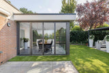 Aanbouw met glazen vouwwand-Busscher Serrebouw-Aanbouw,alle,Tuinen,Woonkamer-Aanbouw met glazen vouwwand | OBLY.com-OBLY