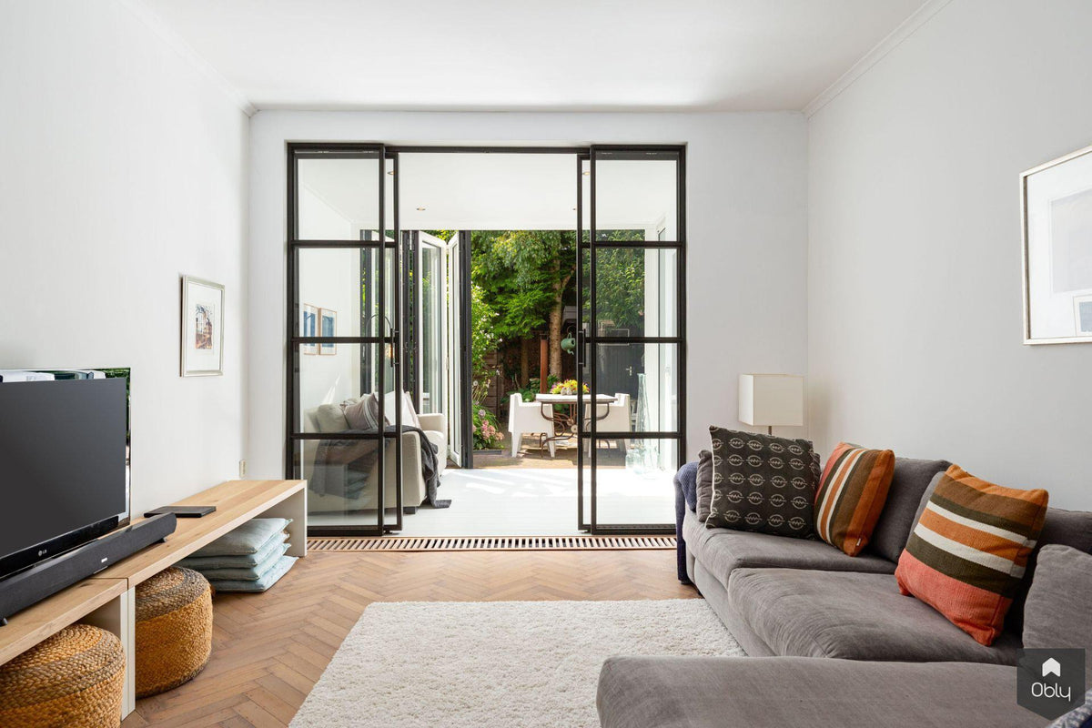 Aanbouw stadswoning-Busscher Serrebouw-Aanbouw,aanbouw met overkapping,aanbouw met plat dak,alle,stalen pui woning,uitbouw woonkamer,woning uitbouw-OBLY