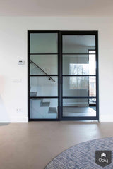 Betonlook vloer met stalen deuren-Willem Designvloeren B.V.-alle,Woonkamer-Betonlook vloer met stalen deuren | OBLY.com-OBLY