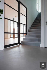 Betonlook vloer met stalen deuren-Willem Designvloeren B.V.-alle,Woonkamer-Betonlook vloer met stalen deuren | OBLY.com-OBLY
