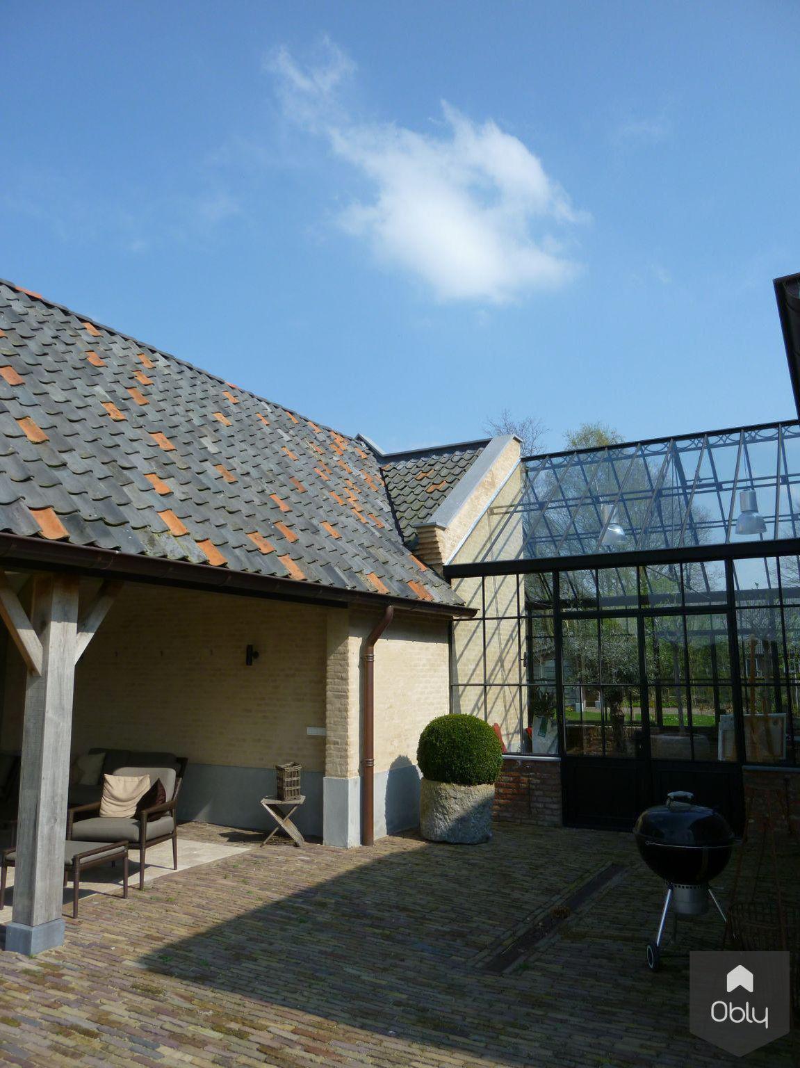 Boerderij Eindhoven exterieur-Van Beek & Dings Interiorarchitects-alle,authentieke landelijke architectuur,boerderij Eindhoven exterieur,exclusieve buitenruimte,Exterieur,karakteristieke boerderij uitstraling,landelijke woonboerderij,luxe gevel renovatie,moderne glazen aanbouw,stijlvolle tuinzijde woning-OBLY