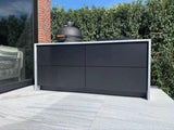 Design buitenkeuken natuurstenen werkblad-COOXS-alle,buiten koken in luxe tuin,buitenkeuken met natuurstenen werkblad,compacte buitenkeuken met barbecue,design buitenkeuken,exclusieve buitenruimte,luxe tuin met buitenkeuken,moderne buitenkeuken inspiratie,strakke wellness tuin-Design buitenkeuken natuurstenen werkblad-OBLY