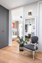 Eiken planken vloer met vloerverwarming-The Woodstore-lichte woonkamer,moderne woonkamer,Woonkamer,woonkamer met grote ramen,woonkamer met houten vloer,woonkamer met open keuken-Eiken planken vloer met vloerverwarming-OBLY
