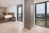 Eiken visgraatvloer in penthouse in purmerend-The Woodstore-alle,lichte woonkamer,moderne woonkamer,ruime woonkamer interieur,Woonkamer,woonkamer met grote ramen,woonkamer met houten vloer-Eiken visgraatvloer in penthouse in purmerend-OBLY