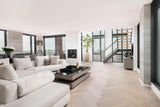 Eiken visgraatvloer in penthouse in purmerend-The Woodstore-alle,lichte woonkamer,moderne woonkamer,ruime woonkamer interieur,Woonkamer,woonkamer met grote ramen,woonkamer met houten vloer-Eiken visgraatvloer in penthouse in purmerend-OBLY