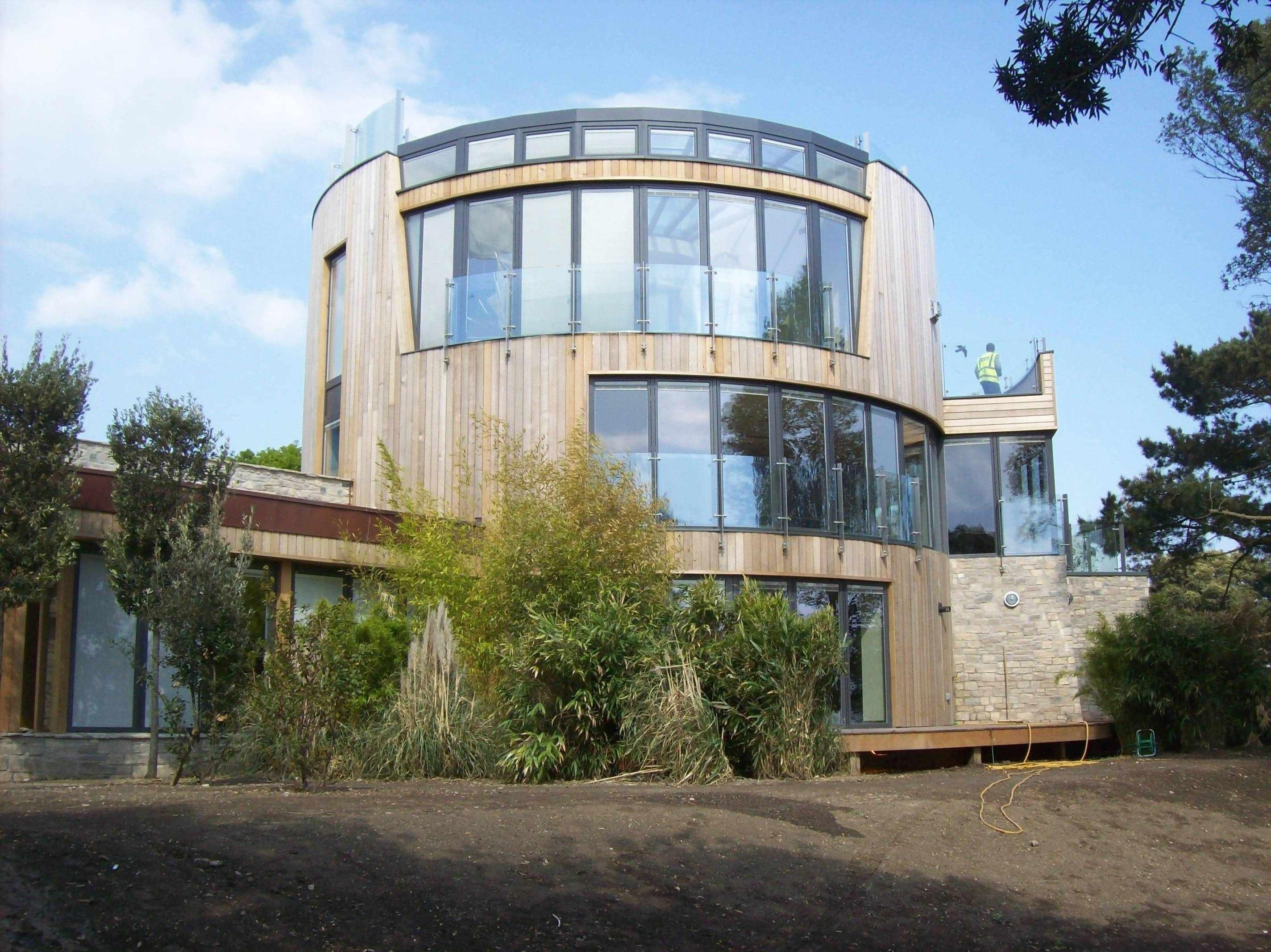 Gesegmenteerde ronde serre Christchurch Engeland-Goes serres-Aanbouw,binnen buiten wonen,glazen aanbouw woning,glazen serre,luxe serre woning,moderne serre,serre aanbouw,serre met glasdak,serre met veel daglicht,serre ontwerp,serre woning-OBLY