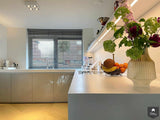 Hoogglans grijze keuken met Corian werkblad-Keukenarchitectuur Midden Brabant-alle,Keuken-OBLY