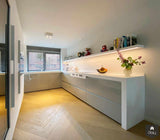Hoogglans grijze keuken met Corian werkblad-Keukenarchitectuur Midden Brabant-alle,Keuken-OBLY