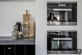 Hoogglans zwarte keuken met industriële look-Mereno-alle,Keuken-OBLY