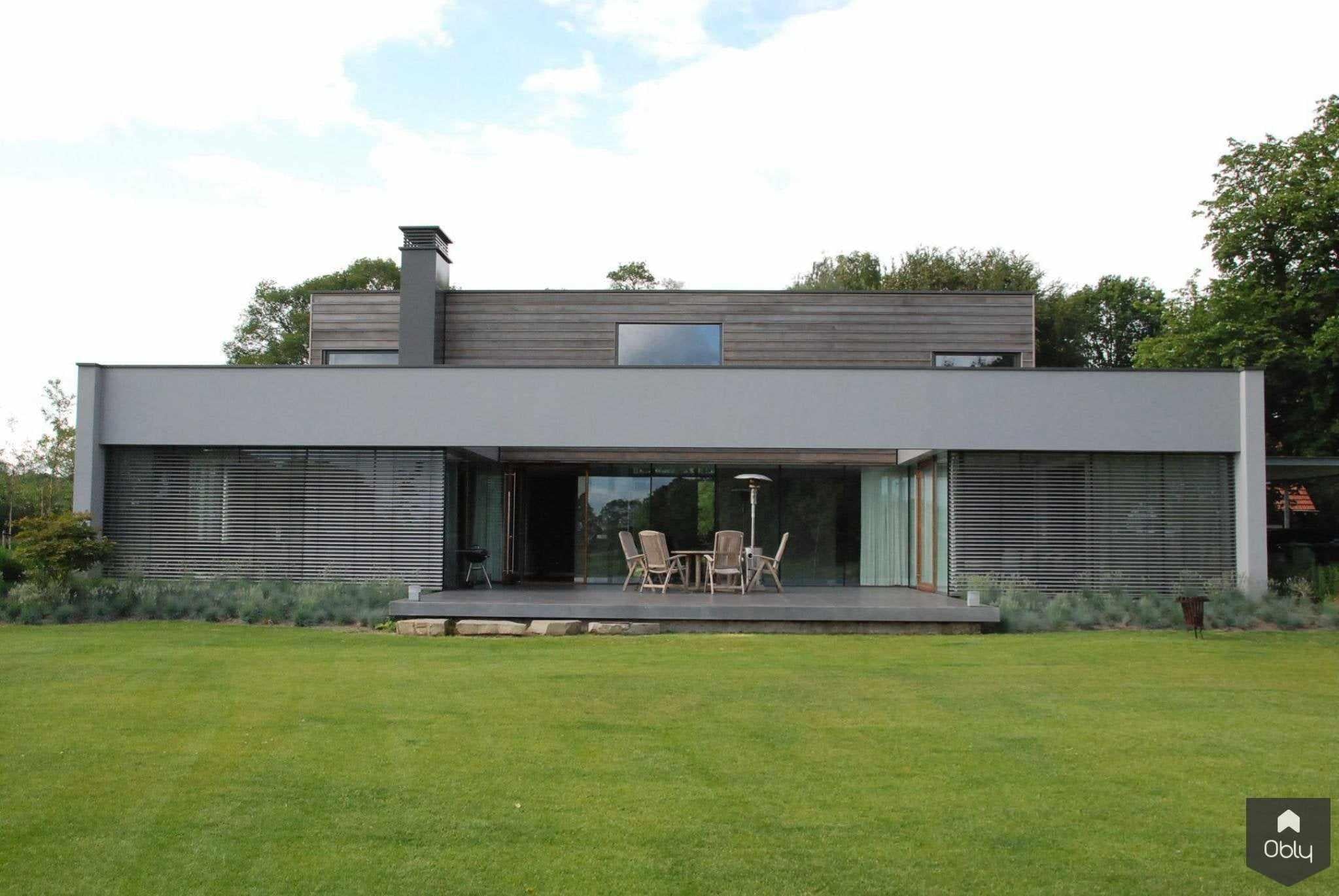 Keesmarcelis-Studio Kees Marcelis-alle,eigentijdse villa,exclusieve architectuur,Exterieur vrijstaand,high end woningontwerp,luxe villa exterieur,minimalistische villa,moderne villa architectuur,moderne vrijstaande woning,moderne woning inspiratie,moderne woning met veel glas,villa met strakke lijnen-OBLY