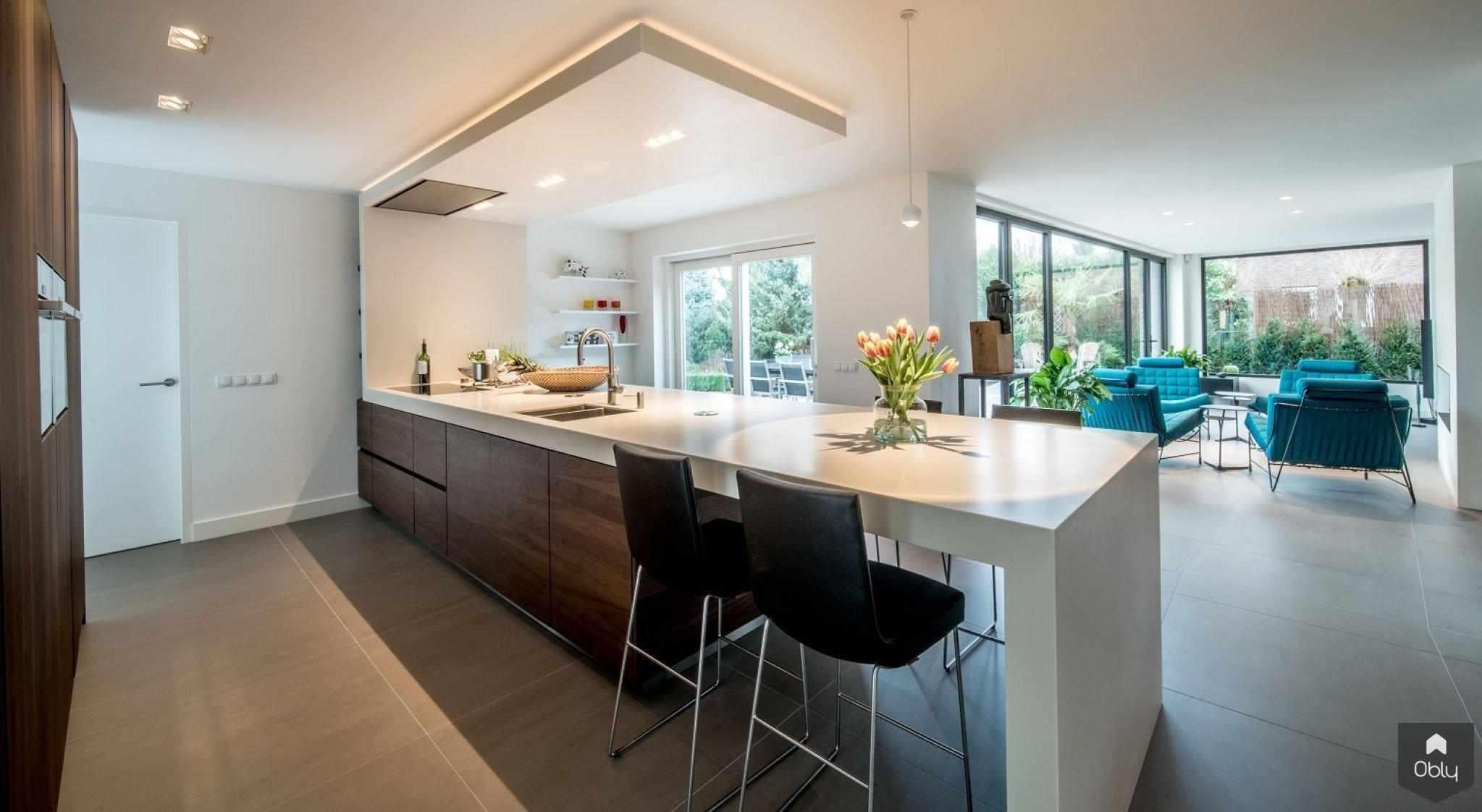 Leefkeuken met Corian werkblad en koof.-Cora Techniek-alle,aluminium schuifpui,Corian keuken,Corian werkblad,design keuken,Keuken,luxe keuken,maatwerk keuken,minimalistische keuken,moderne leefkeuken,Quooker keuken,strak werkblad-OBLY