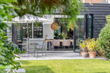 Luxe serreaanbouw met brede vouwwand-Busscher Serrebouw-Aanbouw-OBLY